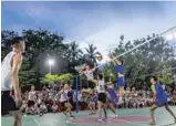  ?? ?? Above: Players compete in a rural volleyball match in Danzhou, Hainan Province.
Left: Some players use stools to play volleyball in an exhibition match in the city of Wenchang in Hainan.