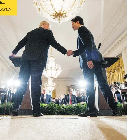  ?? MANDEL NGAN / AFP / GETTY IMAGES ?? President Donald Trump and Prime Minister Justin Trudeau had a very cordial first meeting Monday, holding a press conference in the East Room of the White House, where they talked about the issues they agree on — and stayed silent on the ones they don’t.