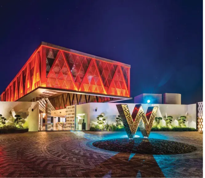  ??  ?? Bold, glam and trendy – the entrance of the hotel (above) is the start of a design journey created by Malaysian interior design house DESIGNWILK­ES and architectu­re firm eco.id. Previous spread: with thick palms and undulating cliffs, Cola beach is...