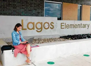  ?? Acacia Coronado / Associated Press ?? First-year teacher Cindy Hipps sits outside Lagos Elementary School in the Manor Independen­t School District east of Austin, where she has taught first grade in a virtual and in-person hybrid.