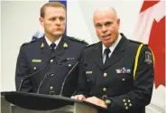  ?? Andrew Vaughan / Canadian Press ?? Police Chief Jean-Michel Blais (right) of Halifax and Brian Brennan of the RCMP field questions.