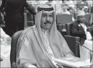  ?? NASSER WAGGI/AP FILE PHOTO ?? Kuwait’s then-Crown Prince Sheik Nawaf Al Ahmad Al-Jaber Al Sabah attends the closing session of the 25th Arab Summit on March 26, 2014, in Bayan Palace in Kuwait City. The 86-year-old sheikh has died, state television reported Saturday.