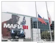  ?? Nick Ut Associated Press ?? FLAGS FLY at half-staff at the E3 event in L.A. to honor the victims of a mass shooting in Orlando, Fla.