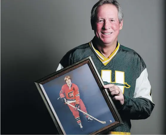  ?? LEAH HENNEL ?? Former NHL player Mike Rogers, shown posing for a portrait in his office in Calgary, will be inducted into the Alberta Hockey Hall of Fame this weekend.