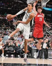  ?? Darren Abate/Associated Press ?? Spurs rookie Victor Wembanyama scored 15 points in 21 minutes in Wednesday’s win over the Rockets.