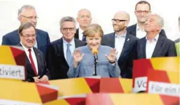  ?? |AP ?? En su campaña, Merkel resaltó los logros que ha obtenido durante su gobierno.