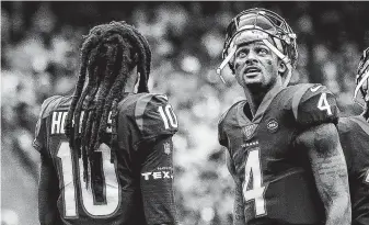  ?? Godofredo A. Vásquez / Staff photograph­er ?? When the Texans are seeking a first down, quarterbac­k Deshaun Watson (4) is usually looking in the direction of receiver DeAndre Hopkins, who has 40 first-down catches this season.