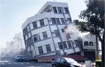  ?? — AP ?? In this image taken from a video footage run by TVBS, a partially collapsed building is seen in quake-hit Hualien, eastern Taiwan on Wednesday.