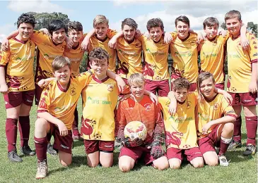  ??  ?? Under 14 grand final winners for Drouin were (back left) Dennis Pilikidis, Charlie Tsuchida, Aleksandr Tabensky, Finley Lock, Conor McCluskey, Dylan Sotiropoul­os, James Short, Thomas Dennis, Ethan Hall (front) Calvin Langford, William Payne, Beau Joiner, Darcy Spencer and Tahj Osseweyer.