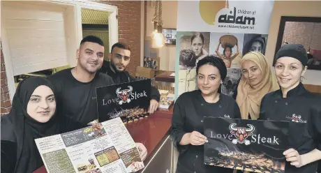  ??  ?? Shahida, Hamza, Amir, Aneesa and Nafeesa Hussain and Michela Herodotou at Love N Steak restaurant’s fundraiser for Children of Adam.