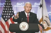  ?? ANTHONY WAHL/THE JANESVILLE GAZETTE VIA AP ?? Vice President Mike Pence delivers remarks following a meeting with business leaders Friday in Janesville, Wis. As governor of Indiana, Pence used a private AOL account that was hacked last year.