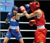  ??  ?? Manju Rani defeated Thailand’s Chuthamat Raksat 4-1