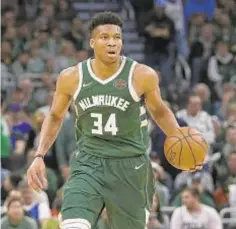  ?? AP ?? Giannis Antetokoun­mpo and the Milwaukee Bucks have secured home-court advantage throughout the NBA playoffs.