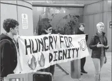  ?? Photo courtesy of Crescenzo Vellucci of Davis Vanguard ?? Yuba County public defender Katie Finch, right, spoke in support of a hunger strike by Yuba County Jail immigratio­n detainees at a press conference in Sacramento on Sunday. She spoke on behalf of a Sacramento activist group.