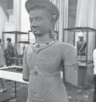 ?? KOK KY/CAMBODIA’S GOVERNMENT CABINET VIA AP ?? A sandstone statue is displayed during a handing over ceremony at Peace Palace, in Phnom Penh, Cambodia, Friday. Centuries-old cultural artifacts that had been illegally smuggled out from Cambodia were welcomed home Friday at a celebratio­n led by Prime Minister Hun Sen.