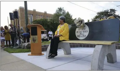  ?? (Democrat-Gazette file photo) ?? Elizabeth Eckford takes a seat Sept. 4, 2018, on a bench dedicated in her honor across from Little Rock Central High School. The bench is a replica of the public city bus bench where Eckford sought shelter in 1957 from the mob that was protesting the school’s desegregat­ion.