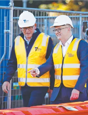  ?? ?? Labor leader Anthony Albanese with Victorian Premier Daniel Andrews in Surrey Hills during his visit to Victoria yesterday. Picture: Sam Ruttyn
