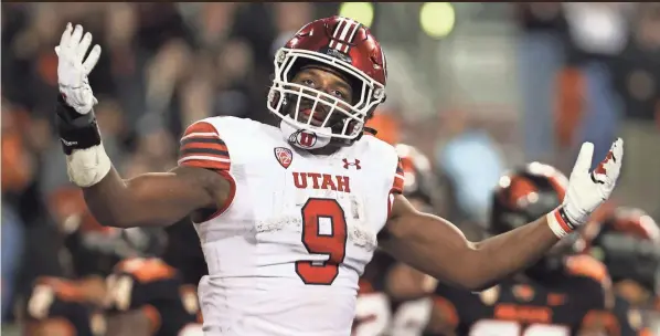  ?? BRIAN HAYES/STATESMAN JOURNAL ?? Dayton native Tavion Thomas rushed for 1,041 yards and 20 touchdowns this season for Utah.