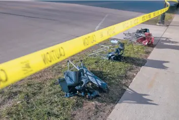  ?? JIM VONDRUSKA/GETTY ?? Abandoned items Monday in Waukesha, Wisconsin, where a vehicle plowed into a parade route Sunday.