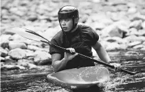  ?? AFP photo ?? Kazuki Yazawa exercises for a Kayak slalom competitio­n on Tamagawa river in Ome city. —