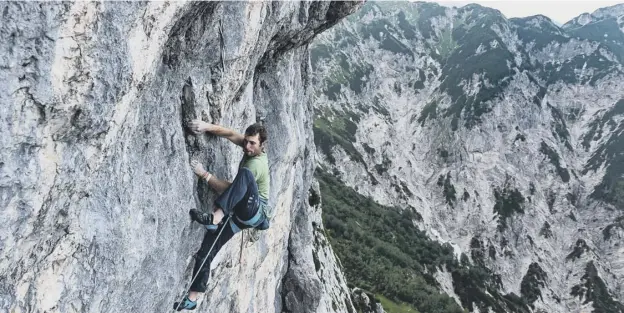  ??  ?? 0 Robbie Phillips said of the final rock climb in Austria: ‘The handholds are so small that a few degrees too warm and my hands sweat and slip off the holds’