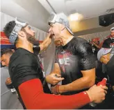  ?? John Bazemore / Associated Press ?? Cardinals pitcher Jack Flaherty (right) celebrates with teammate Daniel Ponce de Leon after the Cardinals beat the Braves 131 in Atlanta.