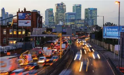  ?? Photograph: Marcin Rogozinski/Alamy ?? London traffic near Canary Wharf. Failing to address carbon emissions from road transport – 90% of the total – are key to why the UK will miss its legally binding carbon targets.