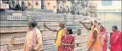  ?? ANI ?? ■ People take a look at the stones stored for the making of Ram Temple, in Ayodhya on Tuesday.