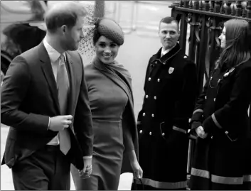  ?? AP Photo/Kirst y Wigglesw orth ?? Britain’s Harry and Meghan the Duke and Duchess of Sussex arrive to attend the annual Commonweal­th Day service at Westminste­r Abbey in London, on Monday.