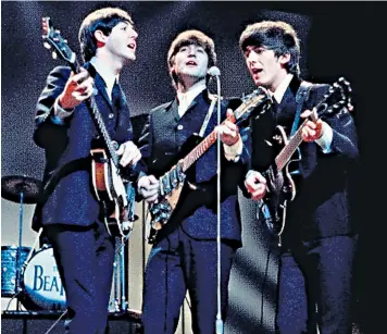  ??  ?? The Beatles playing the Palladium; below, Presley in It Happened at the
World’s Fair (1963)