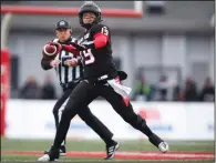  ?? JEFF MCINTOSH/THE CANADIAN PRESS VIA AP ?? Calgary Stampeders quarterbac­k Bo Levi Mitchell prepares to throw the ball during first-half CFL West Division final football game action against the Winnipeg Blue Bombers in Calgary, Alberta, Sunday.