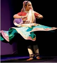  ??  ?? STIRRING PERFORMANC­E: A dancer performs following the flaghoisti­ng ceremony at the consulate in Dubai. Ashwani Kumar and Dhanusha Gokulan