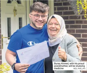  ?? NEIL PHILLIPS ?? Buraq Ahmed, with his proud grandmothe­r, will be studying medicine