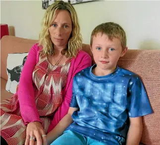  ?? PHOTO: MONIQUE STEELE/STUFF ?? Hilary O’Brien-Anderson and her son Finn, 7, at their Sydenham home yesterday. It was burgled on Wednesday.