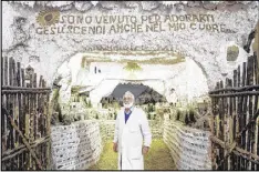  ?? GIANNI CIPRIANO / THE NEW YORK TIMES ?? Giuseppe Ianni, a street cleaner and author in Rome, started working on this Nativity scene during his spare time 40 years ago and has never stopped.