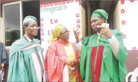  ??  ?? L-R: Vice Chancellor, Anchor University, Prof. Joseph Afolayan; his wife, Mrs Joan Afolayan and the Chairman of Good Shepherd School, Dr. Adebayo Oyeyemi at the prize-giving day of Good Shepherd Schools, Meiran Campus, Lagos...recently