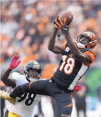  ?? GARY LANDERS/ASSOCIATED PRESS ?? Cincinnati wide receiver A.J. Green goes up for a catch last week against Pittsburgh. The Bengals visit Kansas City tonight in a game expected to be short on defense.