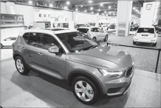  ?? MATT ROURKE / AP ?? A Volvo XC40 sits on display during a press preview of the Philadelph­ia Auto Show in January. The Volvo XC40 is one of six SUVS going on sale this year that are worth waiting for, according to the automotive website Edmunds. The others are: Hyundai...