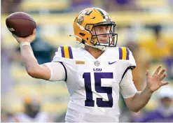  ?? AP Photo/Gerald Herbert, File ?? ■ LSU quarterbac­k Myles Brennan passes against Mississipp­i State on Sept. 26, 2020, in Baton Rouge, La. Brennan has decided to exit the transfer portal and return to LSU under new head coach Brian Kelly.