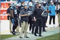  ?? Brian Westerholt / Associated Press ?? Panthers coach Matt Rhule, left, and offensive coordinato­r Joe Brady watch during a Nov. 22 game against the Lions.