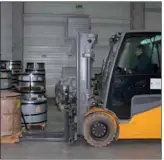  ?? YANG YONGQIAN / XINHUA ?? A worker in the logistics park at Csepel Port in Hungary transports goods using a forklift.