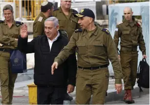  ?? (Jack Guez, pool/Reuters) ?? PRIME MINISTER Benjamin Netanyahu tours a missile boat at the navy base in Haifa on Tuesday.