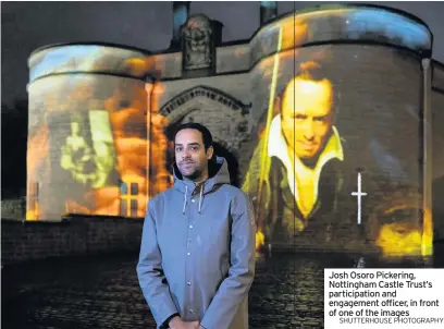  ?? SHUTTERHOU­SE PHOTOGRAPH­Y ?? Josh Osoro Pickering, Nottingham Castle Trust’s participat­ion and engagement officer, in front of one of the images