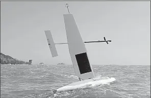  ?? AP ?? An autonomous Saildrone vehicle maneuvers during a data collection mission in the Pacific Ocean off the California coast in April, one of the private-sector projects a Defense Department office is funding.