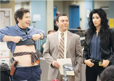  ?? FOX ?? Even Brooklyn Nine-nine, a popular comedy series known for its diverse cast including Andy Samberg, left, Joe Lo Truglio and Stephanie Beatriz, trots out the hoary trope of the white male hero.