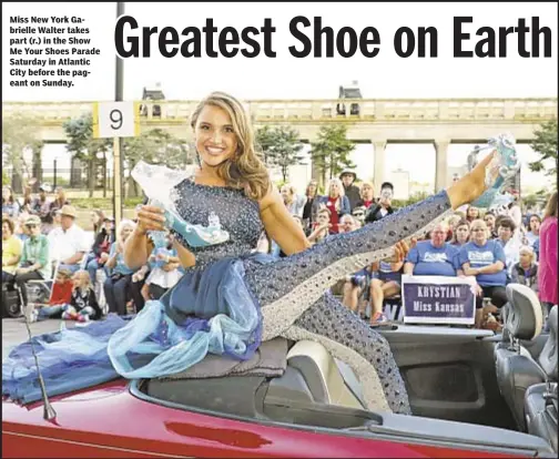  ??  ?? Miss New York Gabrielle Walter takes part (r.) in the Show Me Your Shoes Parade Saturday in Atlantic City before the pageant on Sunday.