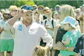  ??  ?? Brendon McCullum with his family on the final day of his farewell Test on Wednesday. — AP