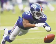  ?? Vera Nieuwenhui­s / Associated Press ?? Giants wide receiver Sterling Shepard misses a pass against the Vikings on Sunday in East Rutherford, N.J. Shepard suffered a concussion during the game.