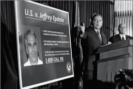  ?? ASSOCIATED PRESS ?? UNITED STATES ATTORNEY FOR THE SOUTHERN DISTRICT of New York Geoffrey Berman speaks during a news conference in New York on Monday. Federal prosecutor­s announced sex traffickin­g and conspiracy charges against wealthy financier Jeffrey Epstein. Court documents unsealed Monday show Epstein is charged with creating and maintainin­g a network that allowed him to sexually exploit and abuse dozens of underage girls.