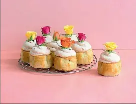  ?? EMMA BOYD ?? Pop open the fizz and make afternoon tea really special with these lemony pink champagne mini cakes.
